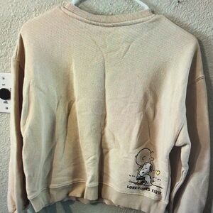 Cream Sweatshirt with Cartoon Graphic